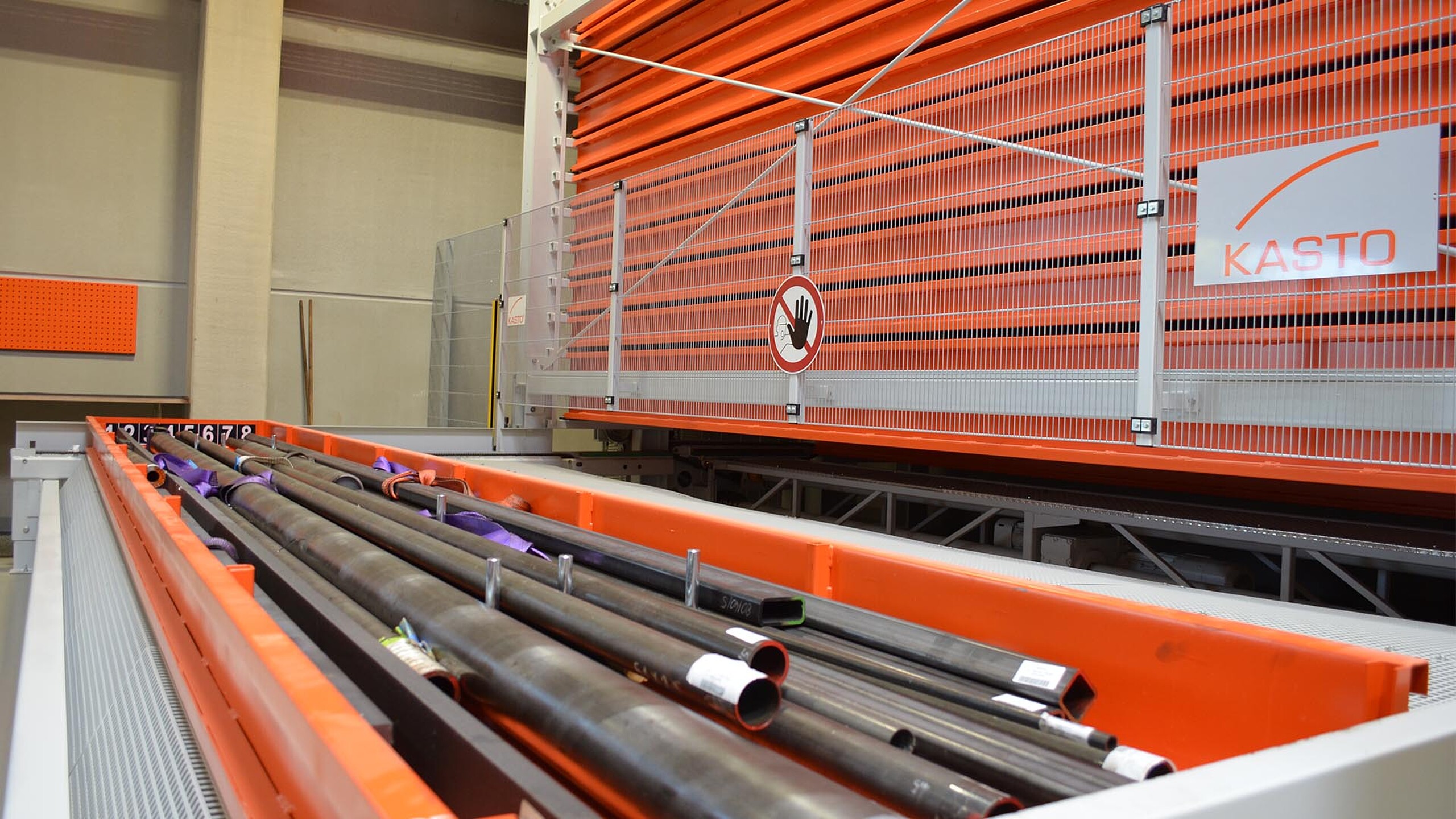 Système de stockage automatique pour produits longs avec extraction de cassettes